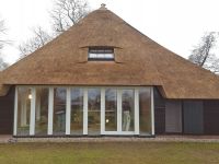 Restauratie / modernisatie achtergevel Gieterse kamelenrug woonboerderij te Giethoorn